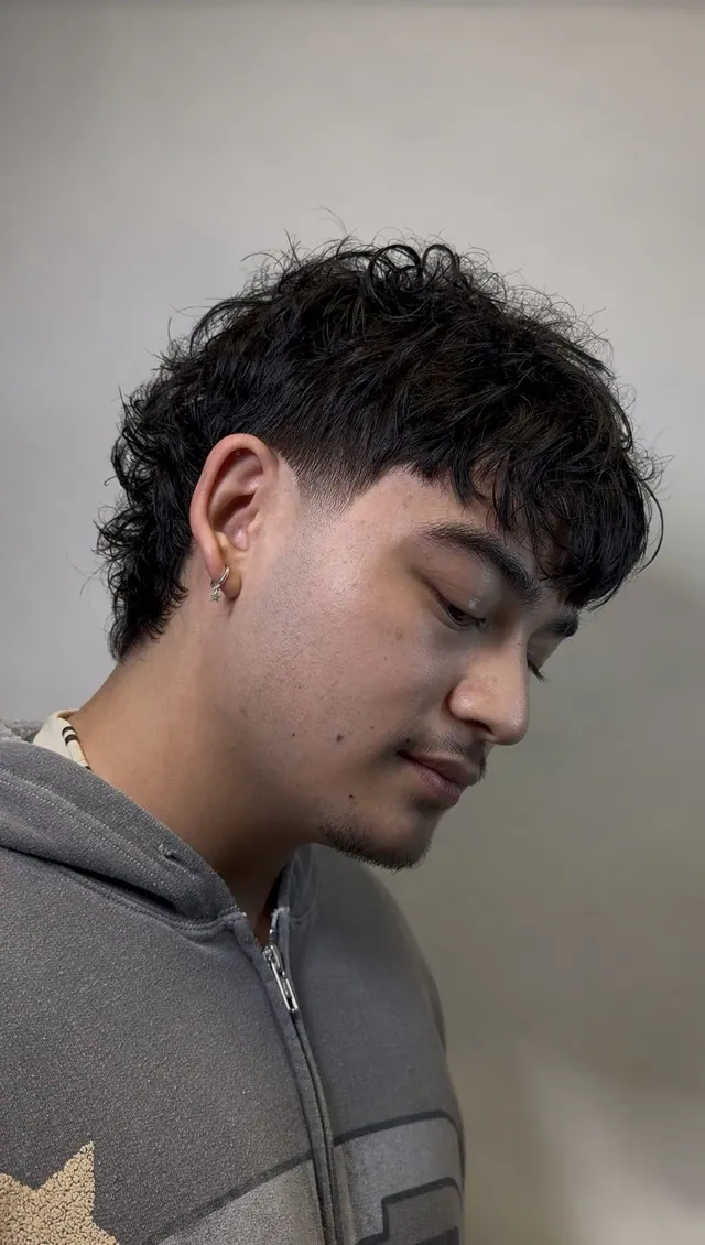 A curtain fringe with a taper